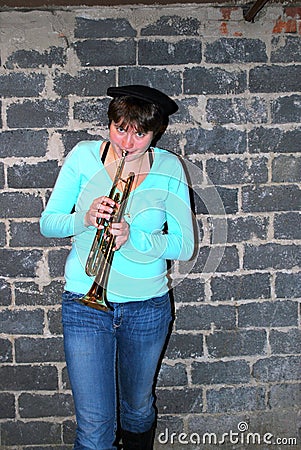 Female trumpet player.