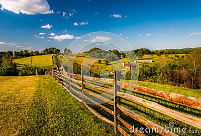 Fence and view of rolling hills and farmland in Antietam National Battlefield