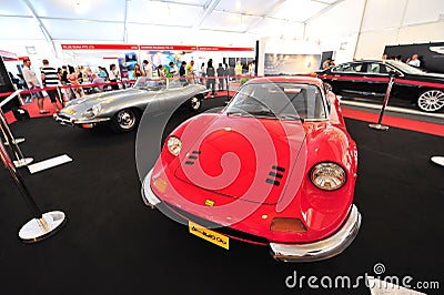Ferrari Dino 246 GT and Jaguar E-type classic cars on display during Singapore Yacht Show at One Degree 15 Marina Club