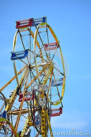 Ferris Wheel Amusement Ride Against Blue Sky