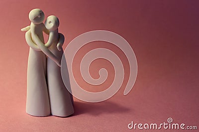 Figurine of couple hugging