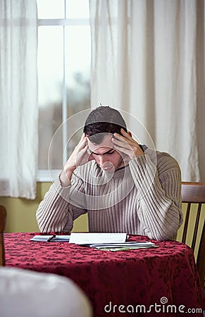 Finances: Man Overwhelmed By Bills and Finances