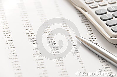 Financial figures and silver pen