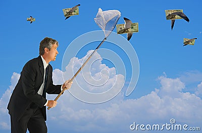 Man netting flying money financial success