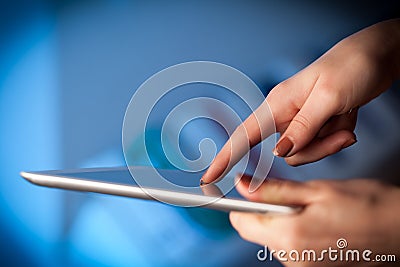 Finger pointing on tablet pc with empty space