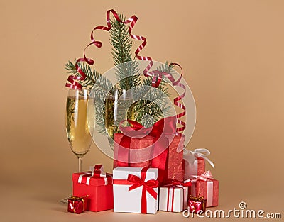 Fir-tree branch, wine glasses with champagne