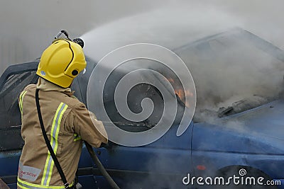 Fire fighter at car fire