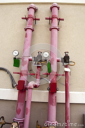 Fire Sprinkler pipes on the exterior of a building