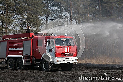 The fire truck extinguishes a fire