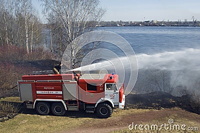 The fire truck extinguishes a fire