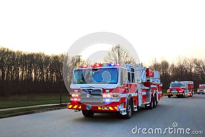 Firefighter Truck and Emergency Vehicles in Street