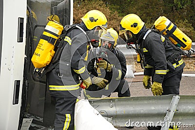 Firefighters at a crash scene.