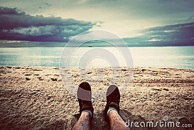 First person perspective of man legs on the beach. Vintage