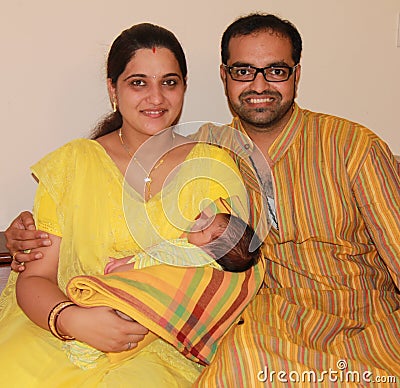 First time Indian (Asian) parent with their baby