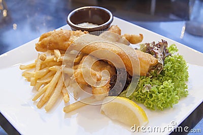 Fish and Chips with Tartar Sauce and Lettuce