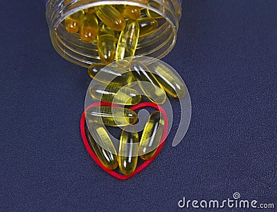 Fish oil, red heart and jar