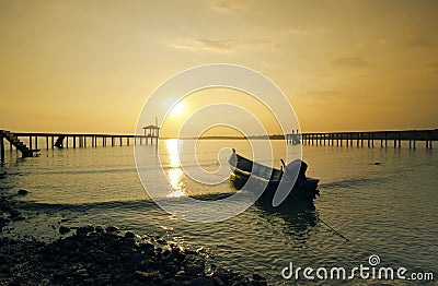 Fisherman boat left alone before sunset