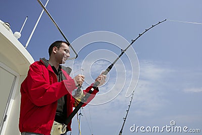 Fisherman fishing on boat big game tuna