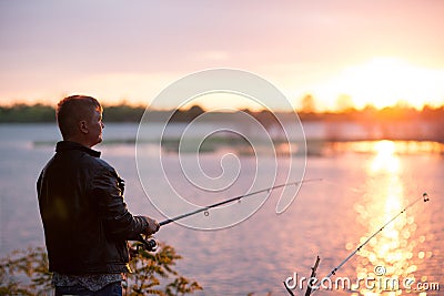 Fisherman on the river bank