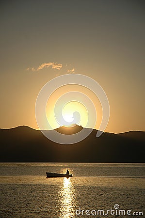 Fishermans boat in the sunrise