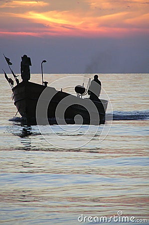 Fishermen on the boat returning from the sea