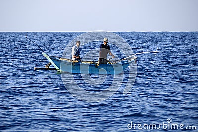 Fishermen at the Indian ocean