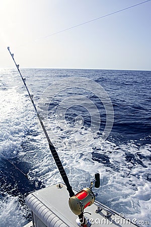 Fishing boat with rod and reels