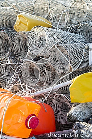 Fishing creels and colored plastic bottles used as