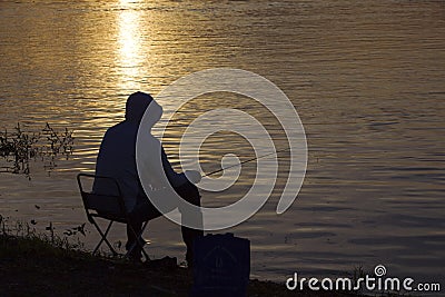 Man Fishing River