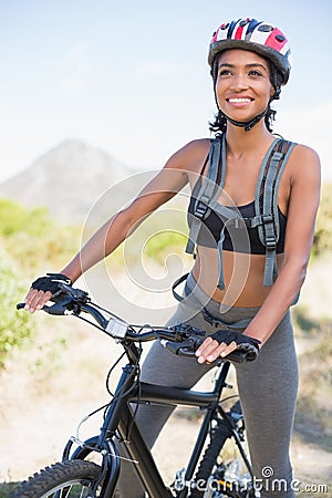 Fit woman going for bike ride