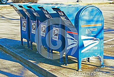 Row of US mail drop boxes