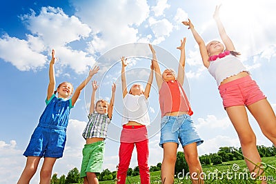 Five wonderful children jumping in the air