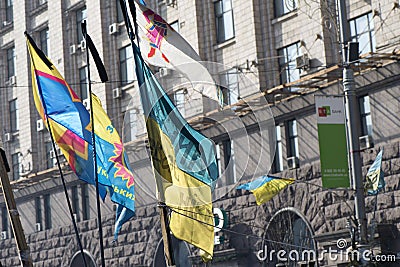 The flag of Ukraine on the barricades of Kiev