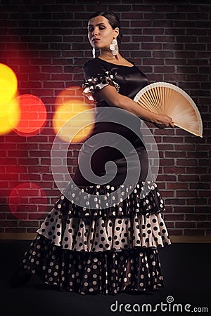 Flamenco dancer with spanish hand fan