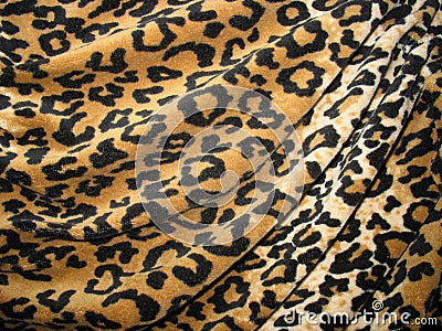 Fleecy brown draped leopard skin fabric