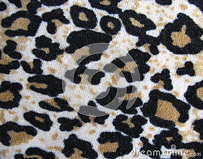 Fleecy white and brown leopard skin fabric