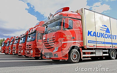 Fleet of Red Long Haulage Trucks