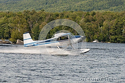 Float plane or seaplane taking off