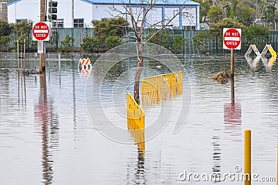 Flooded area with Do Not Enter signs