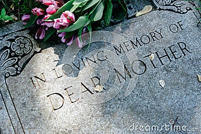 Flowers on Mothers Grave Marker