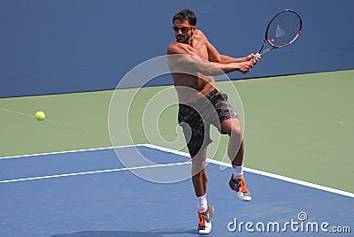 Professional tennis player Janko Tipsarevic practices for US Open at Billie Jean King National Tennis Center