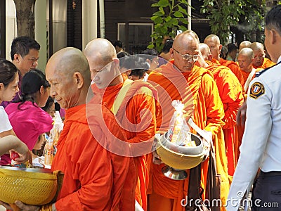 Food offering to Buddhist monks on Visakha Bucha day, Thailand