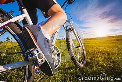 Foot on pedal of bicycle