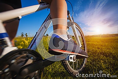 Foot on pedal of bicycle