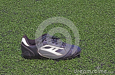 Football shoes on the grass