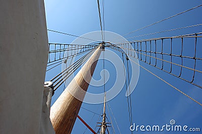 Foresail, Jib, and Wooden Mast of a sailing yacht