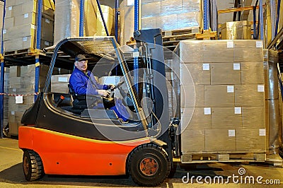 Forklift loader worker at warehouse