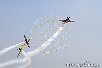 Formation of YAK 52 airplanes at Romanian Air Show