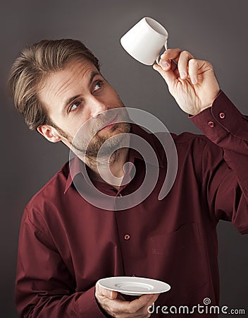 Forty years old business man drinking morning coffee