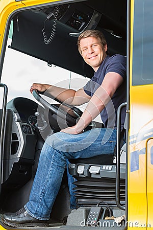Forwarder or truck driver in drivers cap